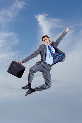 Buy stock photo Business man, heel click and sky with suit, happiness and freedom for success, goal or outdoor for celebration. Young entrepreneur, businessman and dancer with excited jump, comic portrait and clouds