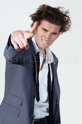 Buy stock photo Business man, finger gun and studio portrait with messy suit, silly and mental health by white background. Isolated businessman, shooting sign and emoji with wrinkled clothes, hair and crazy face