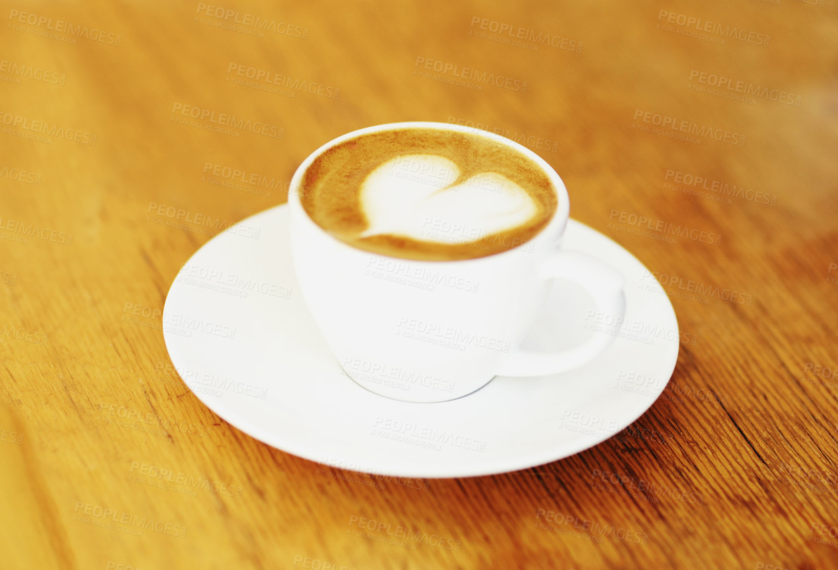 Buy stock photo Retro mug and latte on wooden table in a coffee shop at urban city with espresso with milk. Kitchen, cafe and cappuccino in restaurant to drink in mug and saucer at vintage kitchen in diner 



