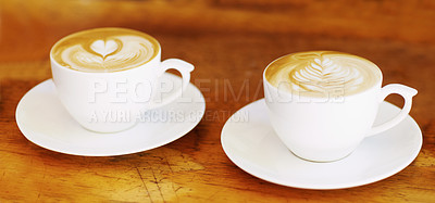 Buy stock photo Latte, retro and coffee cup on brown wooden table at a restaurant to drink expresso in the kitchen. Cafe, coffee and vintage background and espresso aroma with milk and cozy house for breakfast