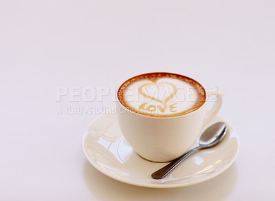 Buy stock photo Coffee cup, cappuccino and heart in foam in studio isolated with white background. Cafe drink, love writing and foamy beverage art with milk and mockup with a closeup of mug, message and spoon