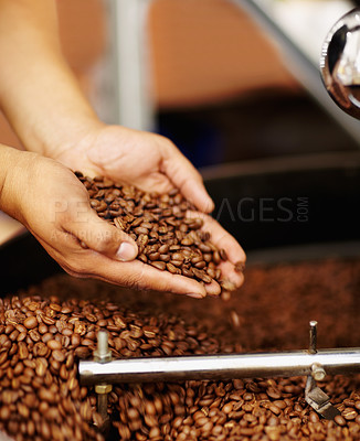 Buy stock photo Cropped shot of hands cupping coffee beans waiting to be ground