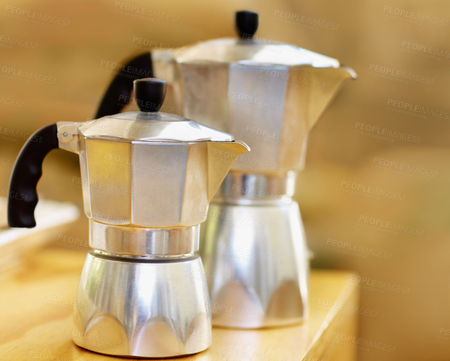 Buy stock photo Coffee, espresso and hot drink boiler for brewing fresh morning beverages or traditional Italian style moka pot for caffeine. Kitchen, appliance and tea making on table or metal household equipment