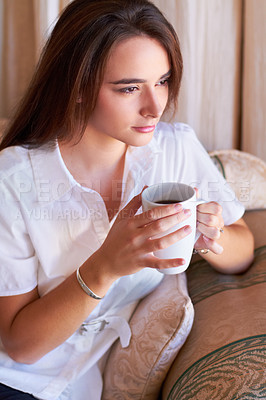 Buy stock photo Relax, woman drinking her coffee in the morning and thinking on sofa in the living room of her home. Peace or freedom, health wellness and female person drink hot beverage for stress relief 