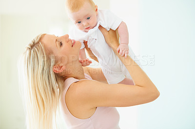 Buy stock photo Mother, baby and smile for family fun, lift and child development or love, security and bonding. Mom, daughter and connection or fun, joy and care in motherhood, happiness and airplane game or play