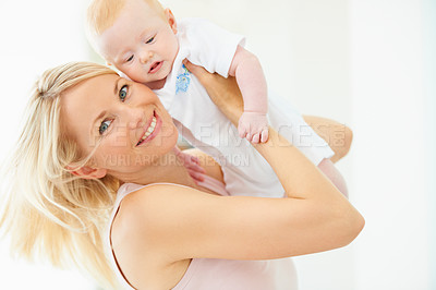 Buy stock photo Mother, baby and smile for play, lift and child development or love, security and bonding in portrait. Mom, daughter and connection or fun, joy and care in motherhood, happiness and airplane game