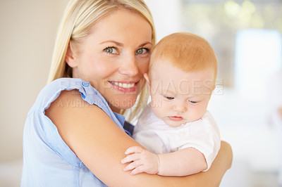 Buy stock photo Portrait, happiness and home mother, baby or family for newborn child growth, youth development or wellness. Happy face, smile and mom holding, hug or embrace kid for bonding, nurture or love
