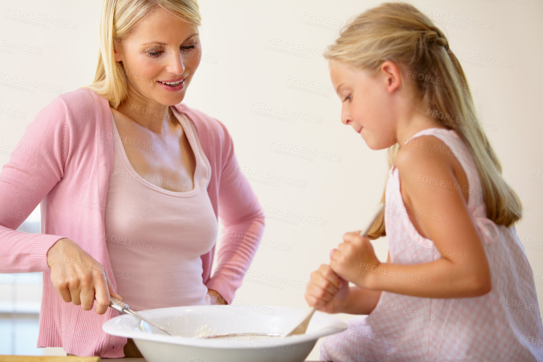 Buy stock photo Bowl, stir and baking mom, child or family mix batch, food or prepare recipe, wheat flour or ingredients. Kitchen equipment, teaching and kid learning home cooking together for Mothers Day bonding