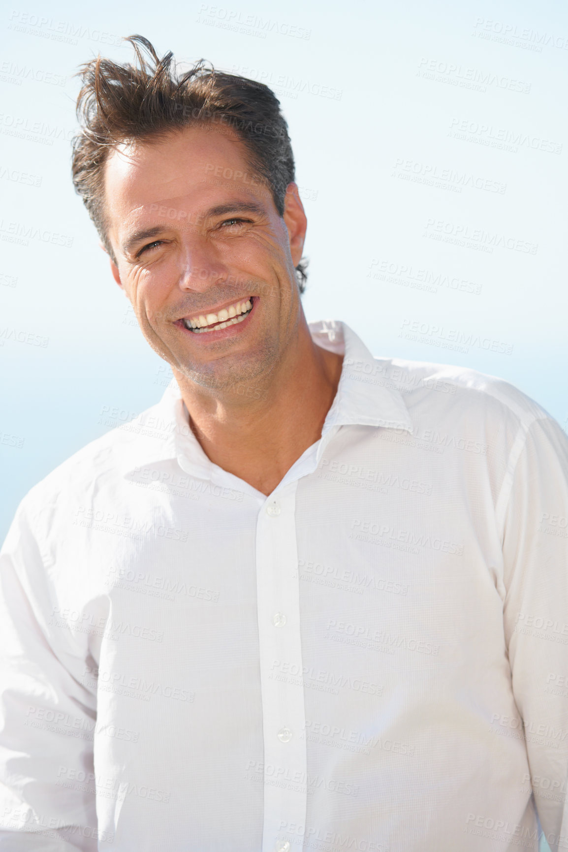 Buy stock photo Portrait of a happy modern man smiling at you confidently