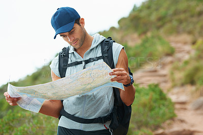 Buy stock photo Man, hiking and map for guidance, nature and direction on trail, fitness and exercise on holiday. Male person, lost and documents for information, travel and journey or adventure to forest for cardio