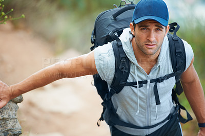 Buy stock photo Portrait, hiking and man with nature, adventure or exercise with wellness, progress or challenge with workout. Person, hiker or guy with backpack, hobby or activity with training, travel or endurance