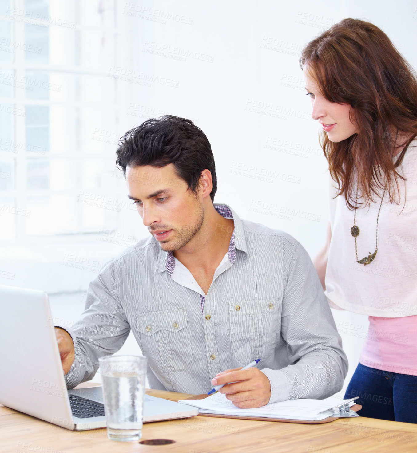 Buy stock photo Laptop, advice and business people thinking, explaining and review of online proposal, planning and brainstorming in office. Professional woman and partner or boss on computer with ideas or feedback