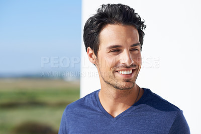 Buy stock photo Portrait of a handsome young man standing outside