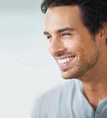 Buy stock photo Happy, thinking and man laughing at home with positive attitude, energy or mindset. Smile, face or male person with funny memory in house with good mood, confidence or chilling on day off or weekend