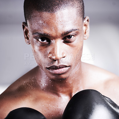 Buy stock photo Boxing, gloves and portrait of black man with power, fitness and workout challenge at sports club. Strong body, face of athlete or warrior boxer in gym with sweat and confidence in competition fight.