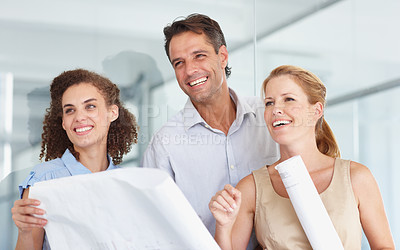 Buy stock photo Happy business people, blueprint and construction planning in meeting for collaboration at the office. Group or architect team smiling with document, paperwork or floor plan for architecture project