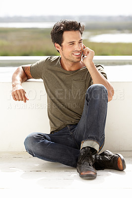Buy stock photo Smile, phone call and man with connection, outdoor and relax with communication. Male person, network and guy with a smartphone, talking and mobile app with casual outfit, trendy clothes and talking