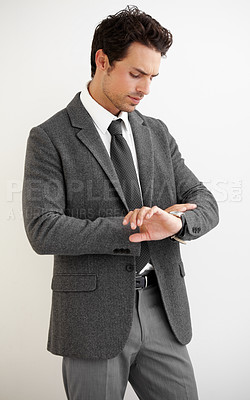Buy stock photo Businessman, watch and thinking for time in studio, late or meeting with mock up on white background. Professional person, manager and checking for clock in space for formal, modern or trendy fashion
