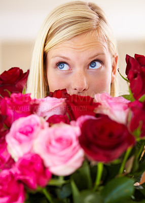 Buy stock photo Woman, rose bouquet and eyes with closeup, beauty and arrangement with studio background, surprise and gift. Look, female model and flowers for love, present and valentines day with romantic gesture
