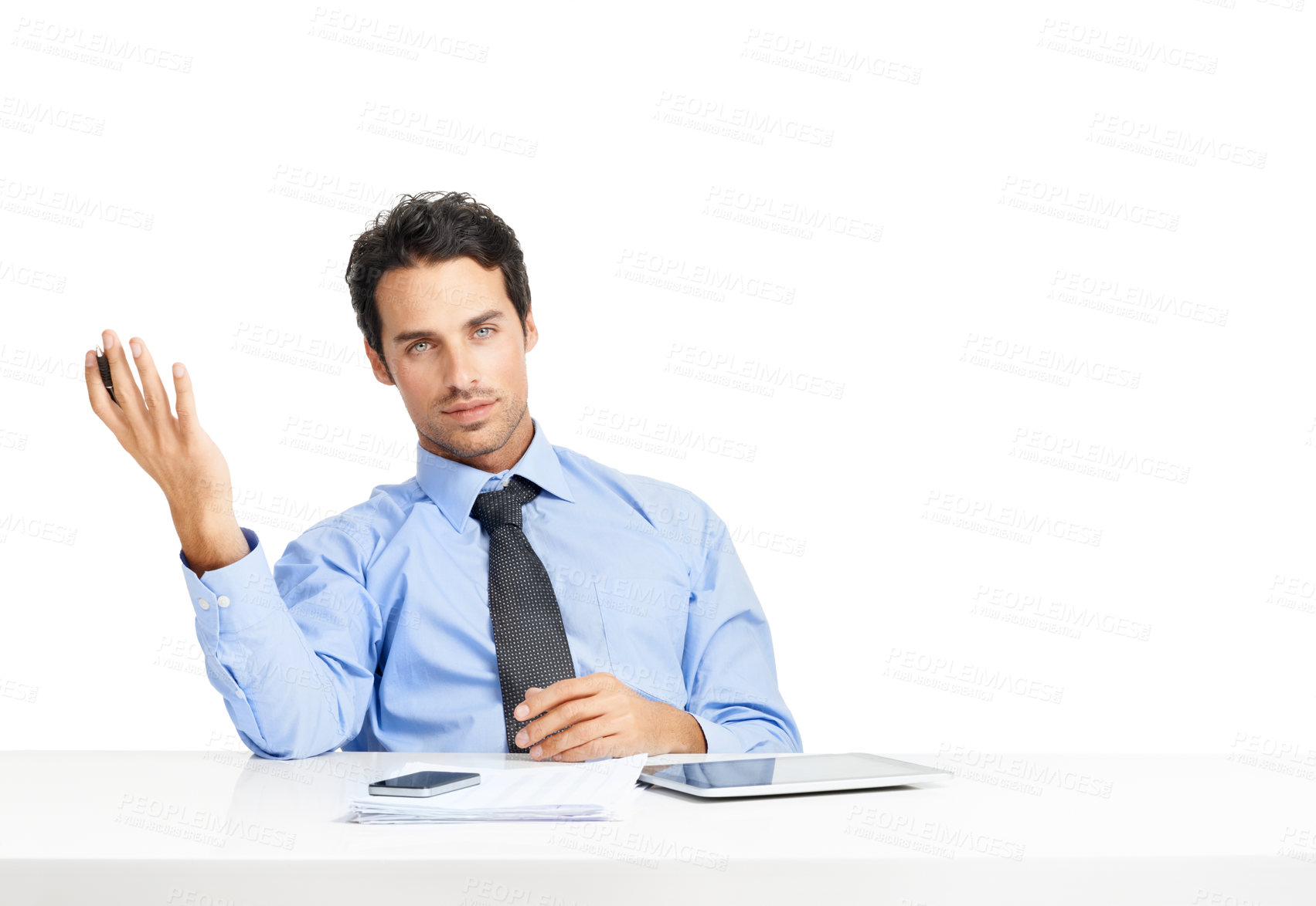 Buy stock photo Portrait, documents and mockup with an annoyed businessman sitting in studio isolated on a white background. Review, gesture and a frustrated male employee working at his desk with blank space