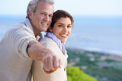 Buy stock photo Mature couple, portrait and outdoor on holiday, airplane hands and happy for enjoying vacation. Man, woman and bonding together with smile, marriage and commitment with affection, and joyful