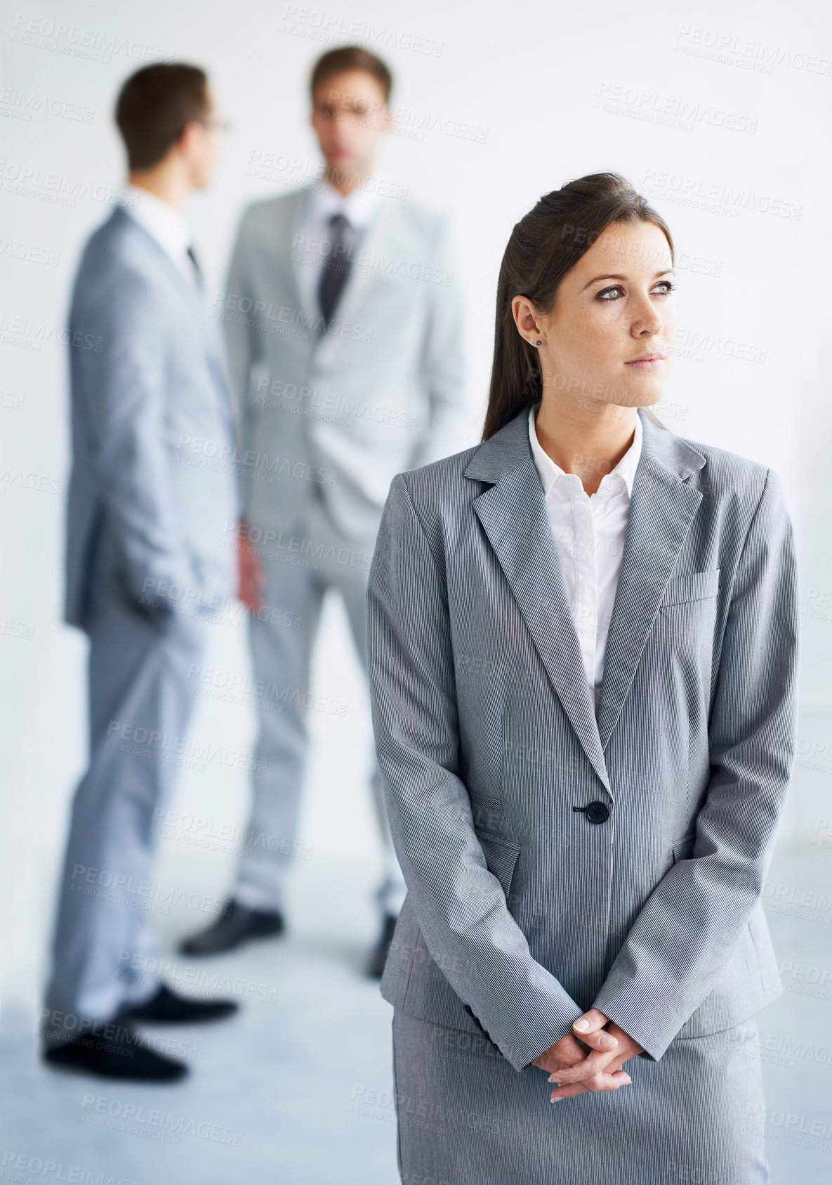 Buy stock photo Businesswoman, serious and thinking for future in law career, standing and ready for job. Worker, corporate attorney in suit and professional in workplace, colleagues in background and confident
