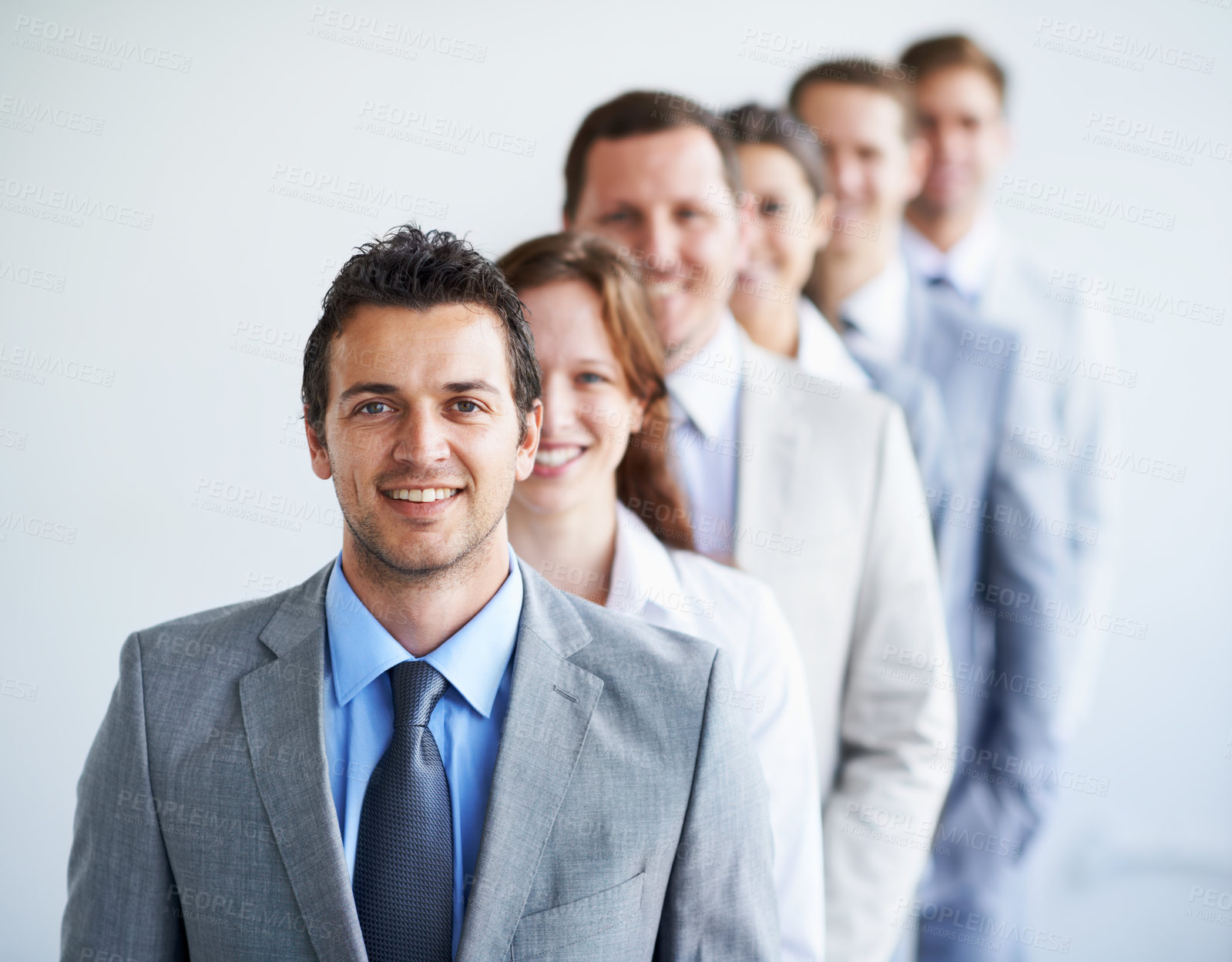 Buy stock photo Happy man, portrait and leader with team in row, workforce, and ready for hiring process. Worker, corporate accountant in suit and professional in workplace, people in background and confident
