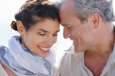 Buy stock photo Couple, face and happy outdoor with hug for romance, love and relationship in nature with relaxing. Mature, man and woman or embrace with smile, comfort and peace for bonding, honeymoon and support 