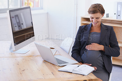 Buy stock photo Happy business woman, pregnant and office with laptop in joy for motherhood at workplace. Female person or employee touching stomach or tummy with smile for pregnancy by computer desk in maternity
