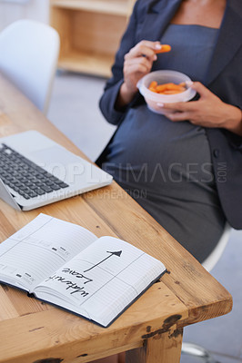 Buy stock photo Pregnant, book and business woman at her desk in the office, getting ready for maternity leave. Schedule, calendar or planner with a corporate professional in the workplace as a mother and employee