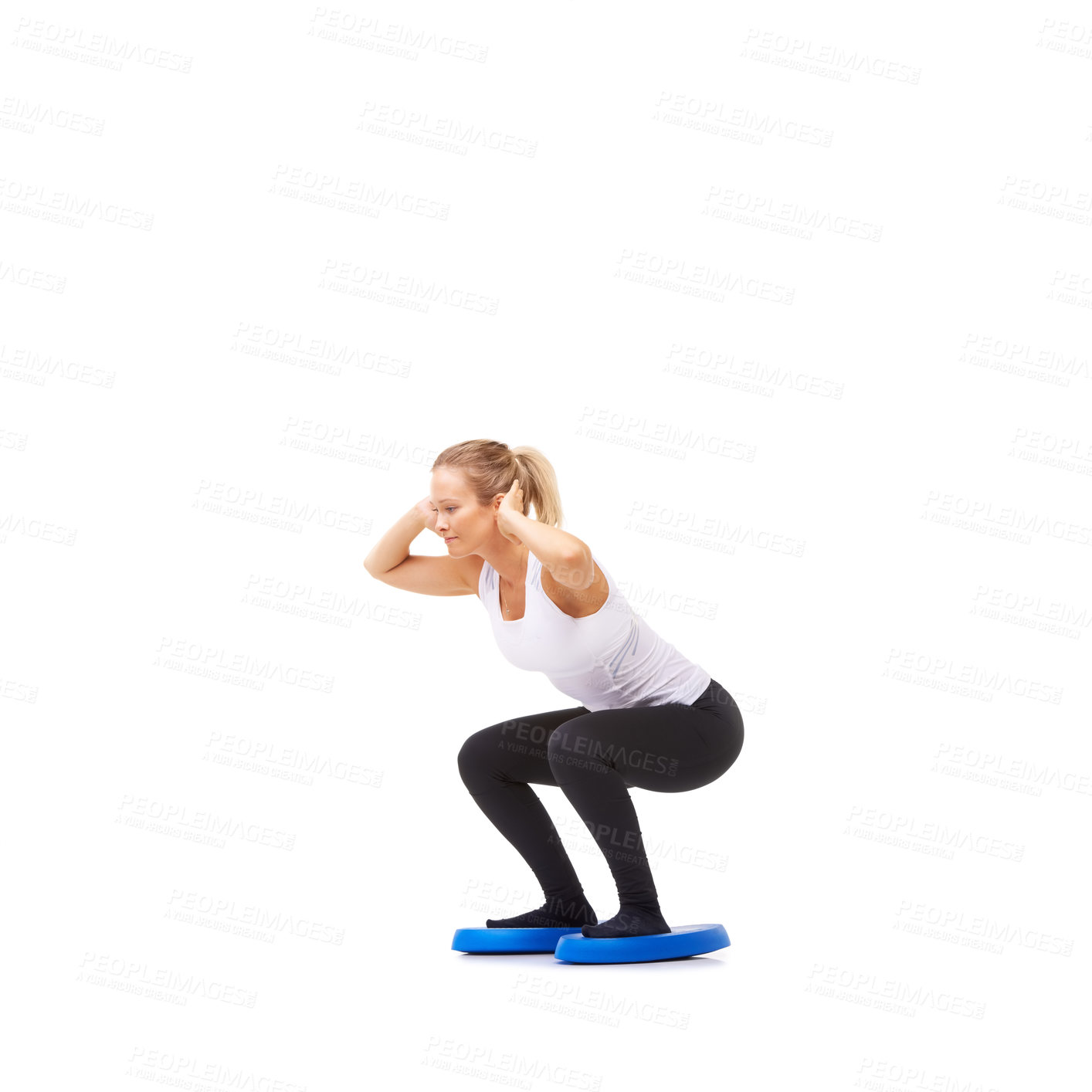 Buy stock photo Balance, health and fitness with woman squat on disk in studio for workout, mindfulness or exercise. Wellness, challenge and training with person on white background for flexibility or aerobics