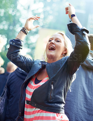Buy stock photo Woman, dance and cheering outdoor at music festival for freedom, performance and entertainment with crowd. Person, happy or shouting at event, concert or show with audience in nature for summer party