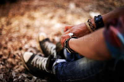 Buy stock photo Hands, relax and quiet with a person on the ground, sitting alone in autumn for peace or calm in nature. Forest, woods or wilderness with an adult closeup from above in the outdoors during fall