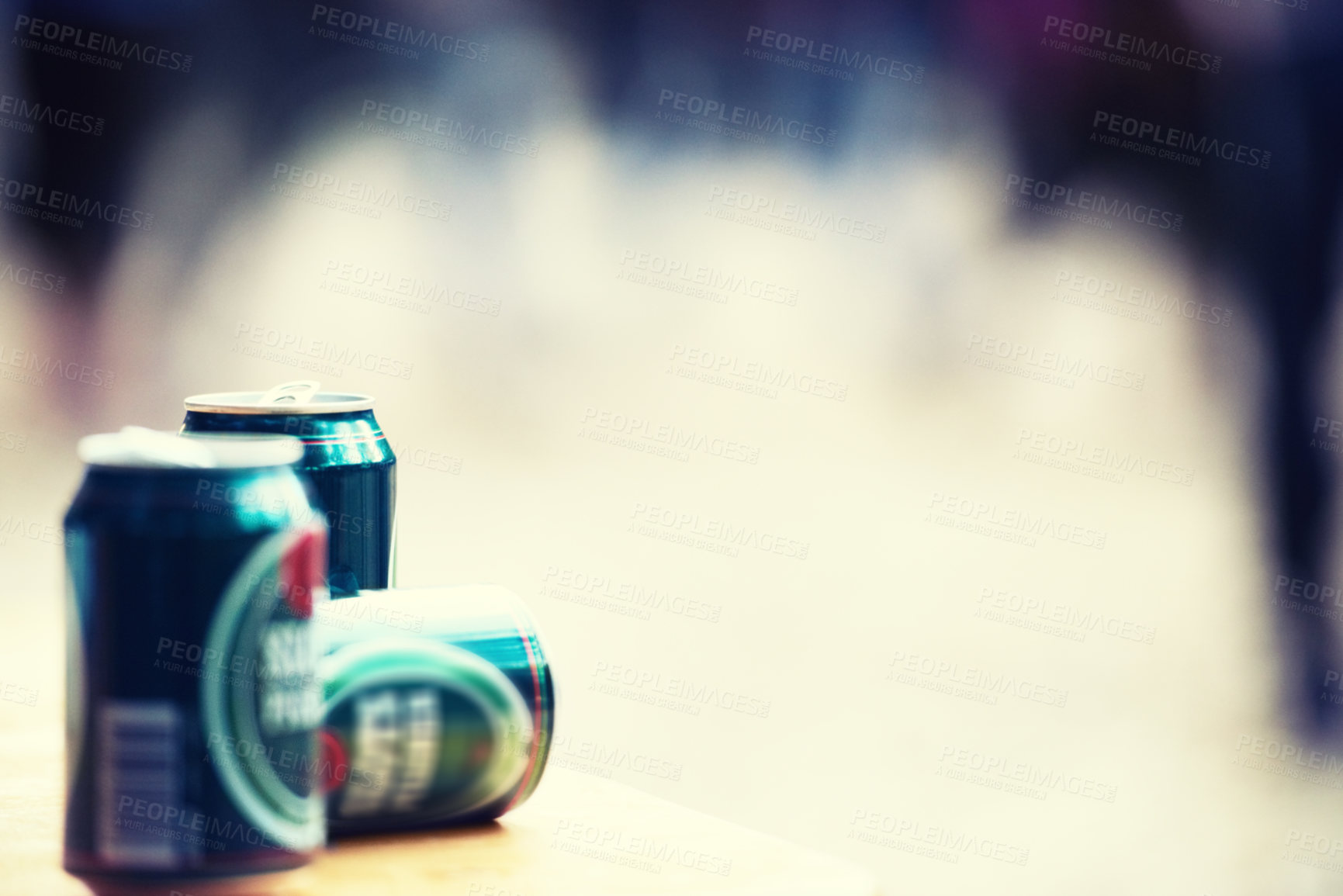 Buy stock photo Space, blurred background and cans of beer closeup outdoor at a music festival for drinking or celebration. Party, product and alcohol with lager or ale at a carnival for the enjoyment of a beverage