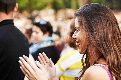 Buy stock photo Crowd applause, outdoor festival and happy woman having fun, happiness and smile at group social gathering. Music concert, audience profile and excited girl vacation, entertainment or clap at event
