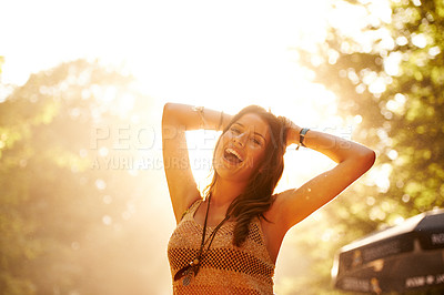 Buy stock photo Portrait, smile and dance with a woman at a music festival outdoor for freedom, energy or excitement. Concert, flare and forest with a happy young person at an event or party for celebration