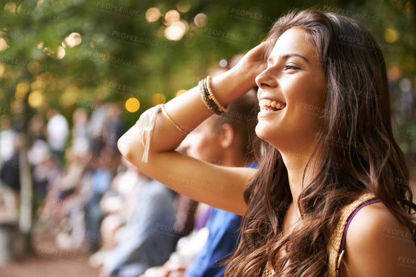 Buy stock photo Forest, outdoor music festival and happy woman, nature crowd or group happiness at woods social event. Gen z concert, audience member and girl listening to entertainment, song or live performance