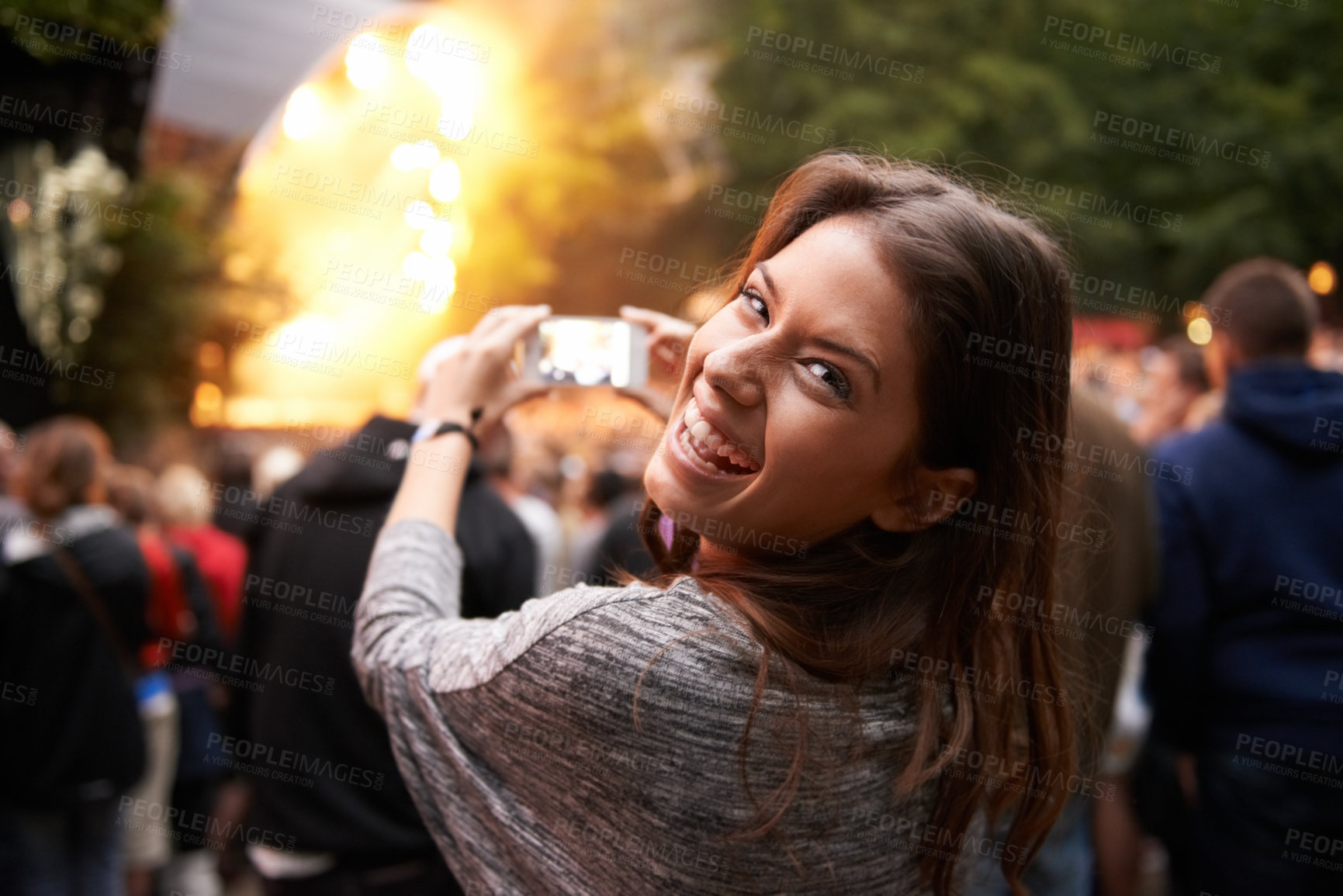 Buy stock photo Woman, music festival and cellphone picture of stage entertainment, party concert or crowd audience. Female person, mobile device and performance rock event or rave, photography or dj celebration