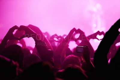 Buy stock photo People, heart hands and pink light for music festival for love, support and care for musician. Fans, artist and together with sign, gesture and show for unity, community or solidarity at rock concert