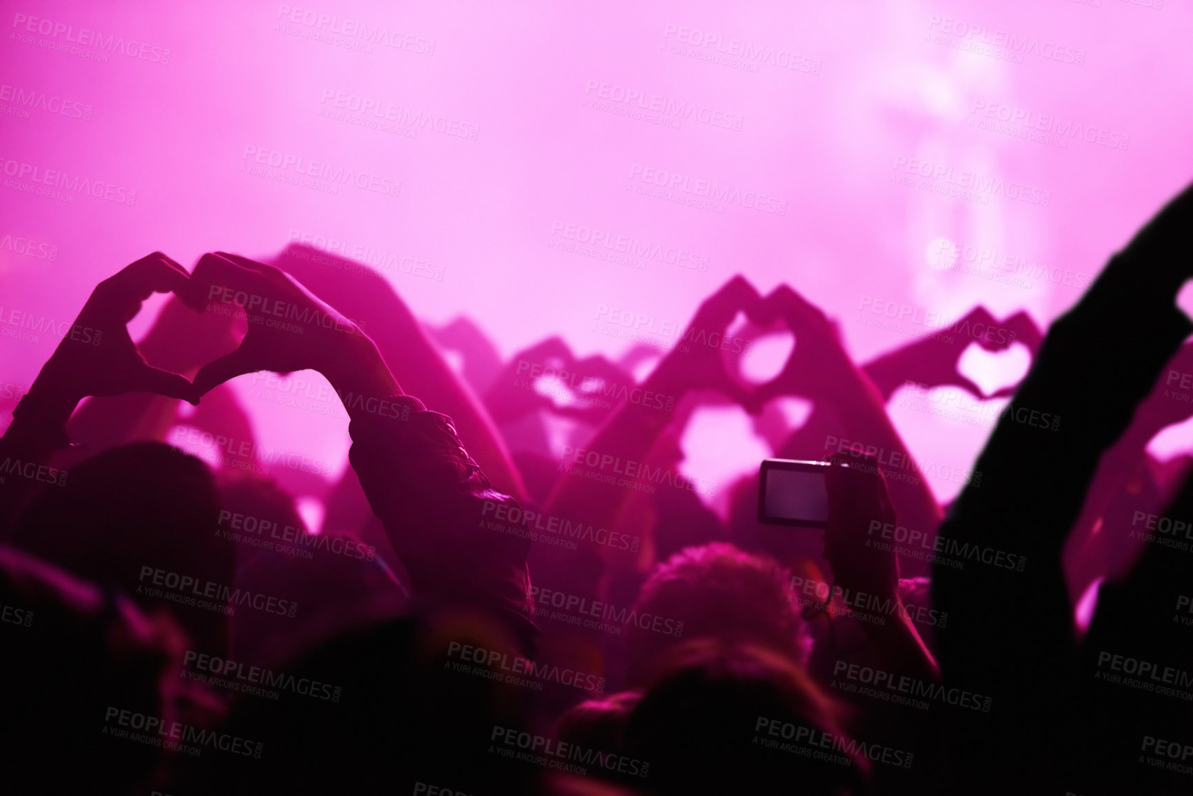 Buy stock photo People, heart hands and pink light for music festival for love, support and care for musician. Fans, artist and together with sign, gesture and show for unity, community or solidarity at rock concert
