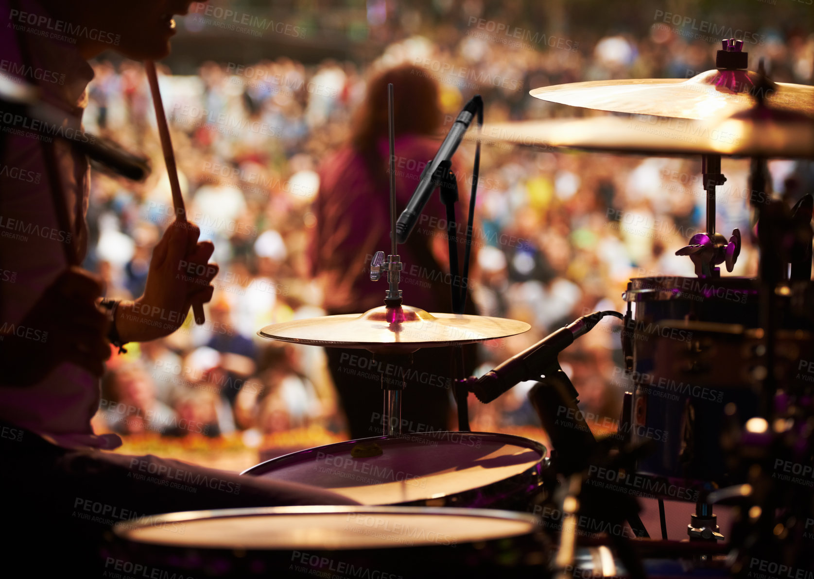 Buy stock photo Drums, playing and closeup of hands, concert and music festival in outdoors, talent and audience. Band, performance and entertainment for crowd, instrument and rhythm for people, sound and rock