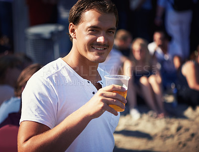 Buy stock photo Portrait of man at music festival with smile, beer and relax in nature for fun concert event. Drink, celebration and person at outdoor party for freedom, adventure and happy people on spring break.