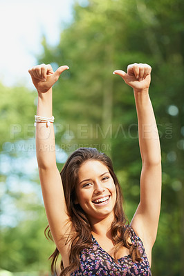 Buy stock photo Thumbs up, portrait and happy woman in a park with arms up celebration, freedom or yes sign outdoor. Travel, face and female person smile with hand emoji in a forest for nature, adventure or journey