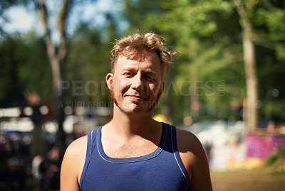 Buy stock photo Portrait of man at music festival with smile, nature and relax in forest for concert event. Happiness, celebration at outdoor party with freedom and adventure, face of person with trees and sunshine.