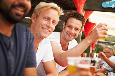 Buy stock photo Happy man, friends and drinking at music festival, cafe or event for summer party or DJ concert. Portrait of male person smile with alcohol or beer for friendship at carnival or outdoor bar stand