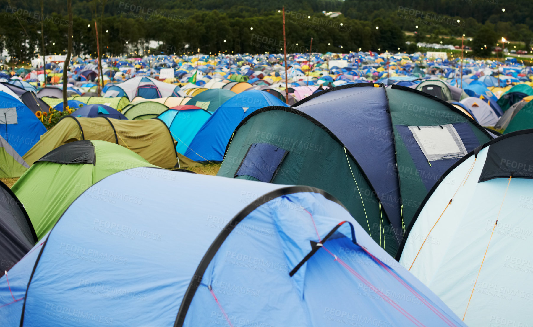 Buy stock photo Tent, field and outdoor for festival or camping in nature, summer or forest for adventure or vacation. Event, campsite or setup for sleeping, rest or shelter in woods, trees or environment background