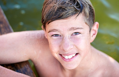 Buy stock photo Portrait of a teenage boy having a swim in a lake