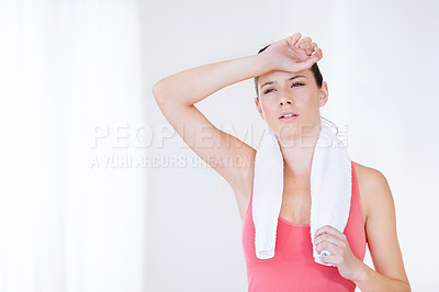 Buy stock photo Gym, space or tired athlete sweating in exercise, fitness training or workout break in studio. Healthy, fatigue or exhausted woman breathing on white background for sports or running performance