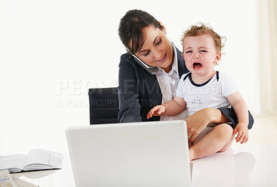 Buy stock photo Woman, home office and phone call with kid, laptop and care with talk, reading and multitasking at desk. Mother, baby boy and cellphone for networking, crying and remote work at pc in family house