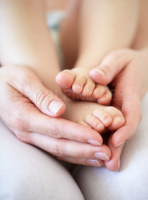 Buy stock photo Love, person and hands with newborn or feet for development, nurture and bonding in nursery of apartment. Family, parent and baby toes with trust, support or care for relationship or closeup in home